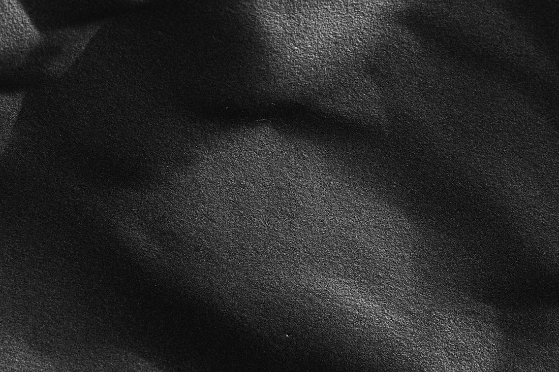 a close up view of a black fabric