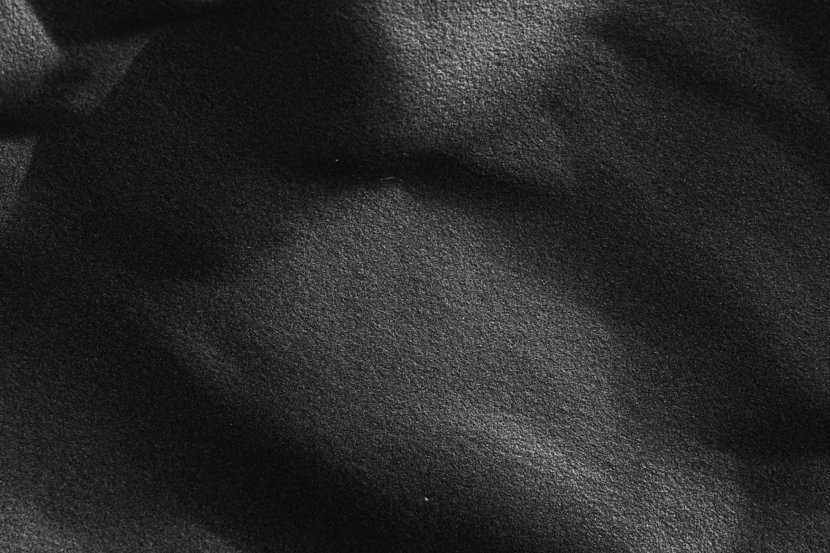 a close up view of a black fabric