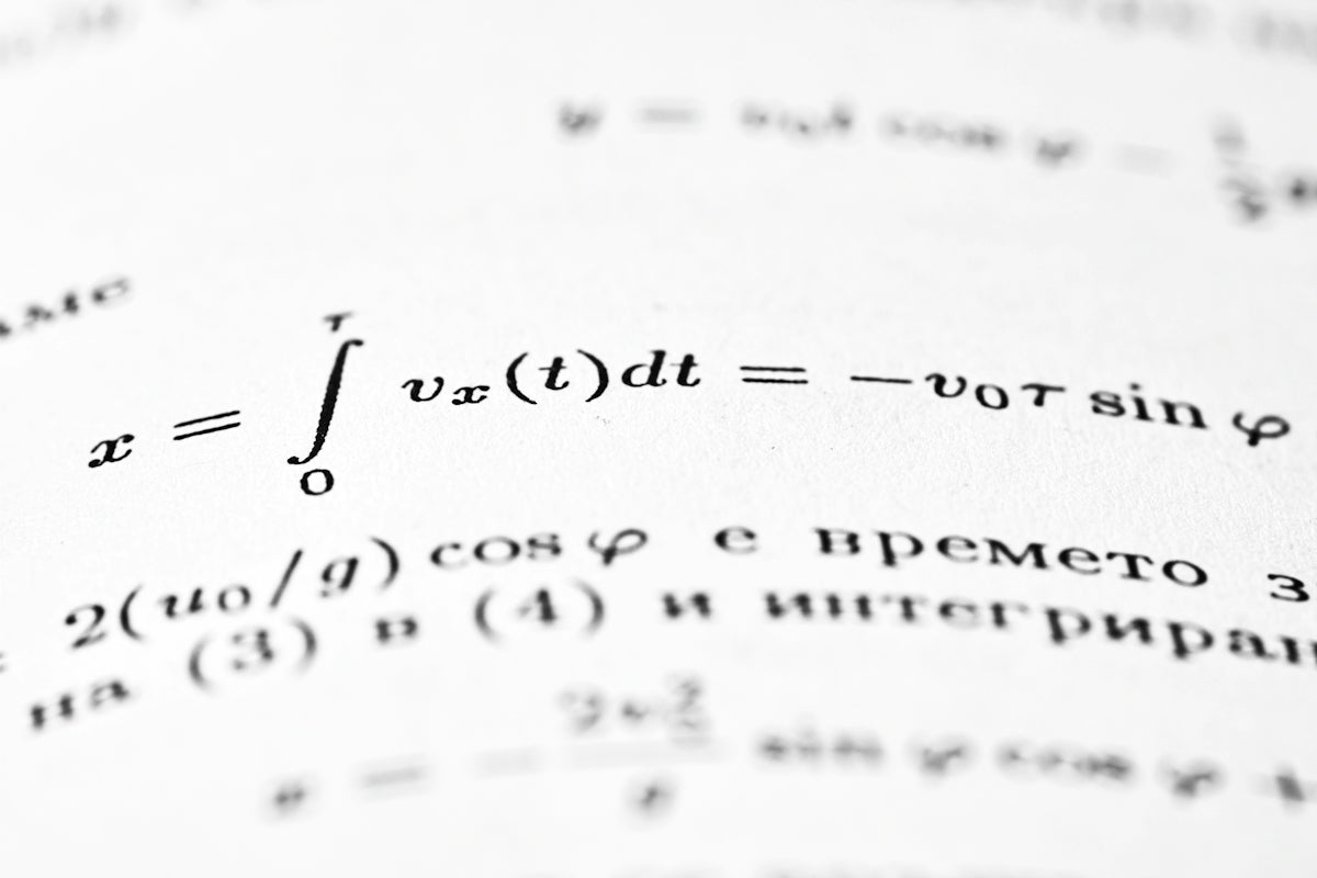 Mathematical formulas are written on a white page